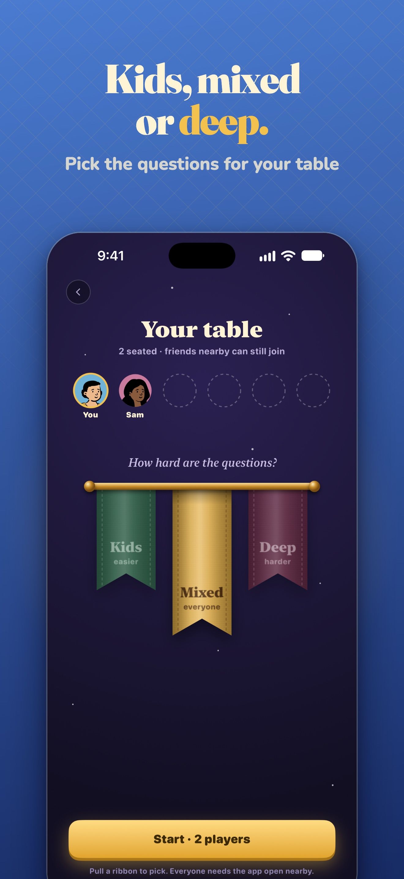 A host’s table with two players seated and three ribbons to pick how hard the questions are